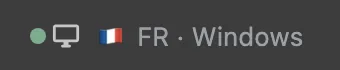 The toolbar indicator: a green dot, a monitor icon, the French flag, FR · Windows